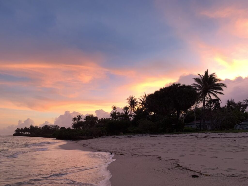 sunset at Diani Beach while on an affordable diani ocean bliss, Kongo river canoeing and sand dune safari